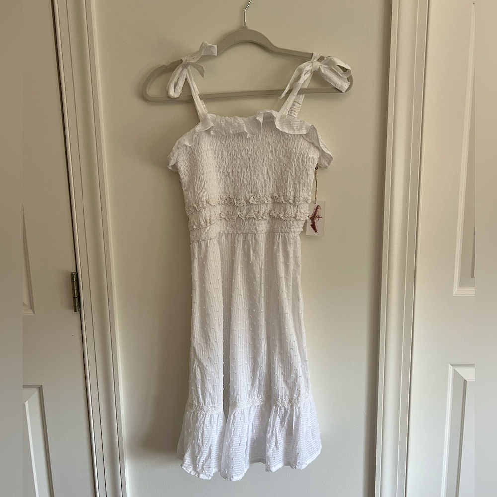 Mid length Swiss button white dress